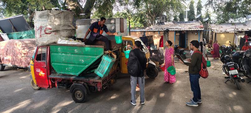 Waste collection vehicle during a field visit